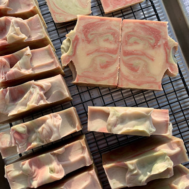 Swirl-patterned soap bars on a cooling rack